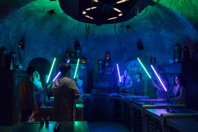 At Star Wars: Galaxy's Edge, guests ignite their newly-built lightsabers at Savi’s Workshop. Photo: Disney Parks